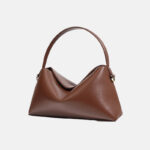 Minimalistische Handtasche aus echtem Leder in Knödelform für Damen