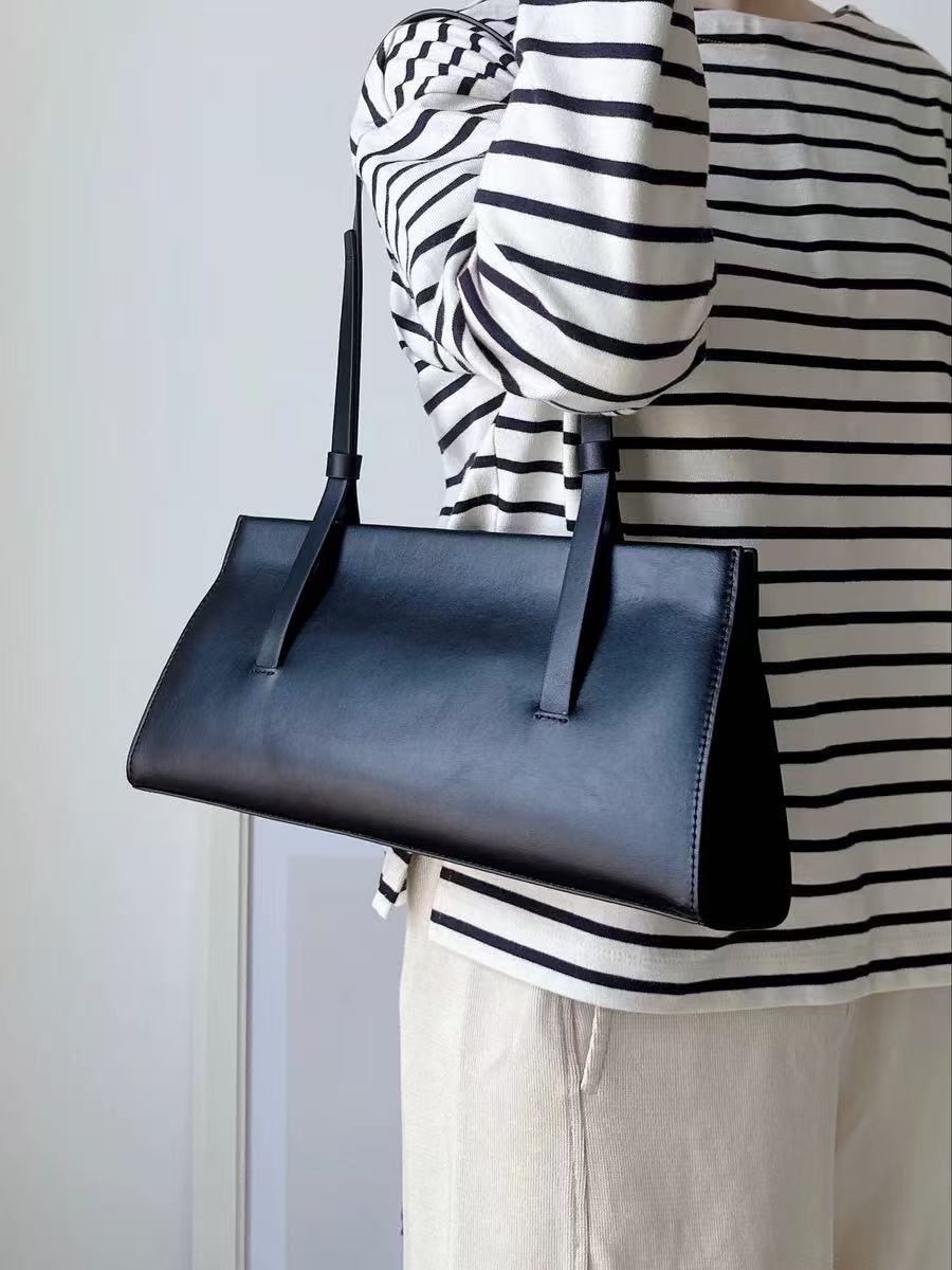 Minimalistische Damen Echtleder Baguette Umhängetaschen mit Magnetverschluss photo review