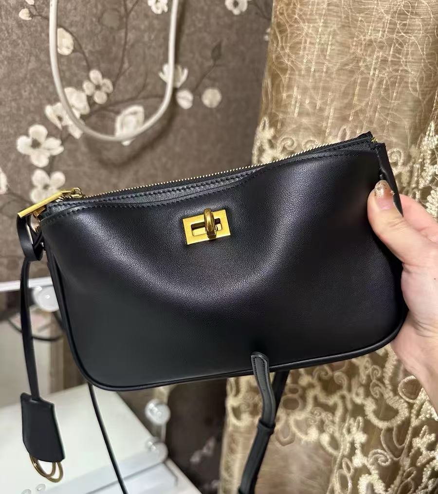 Minimalistische Damen Echtleder Schloss Reißverschluss Umhängetasche Baguette Tasche photo review
