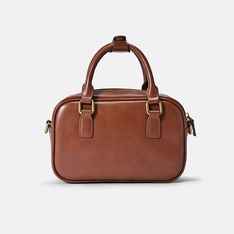 Minimalistische Damen Tasche mit kissenförmigem Griff aus echtem Leder