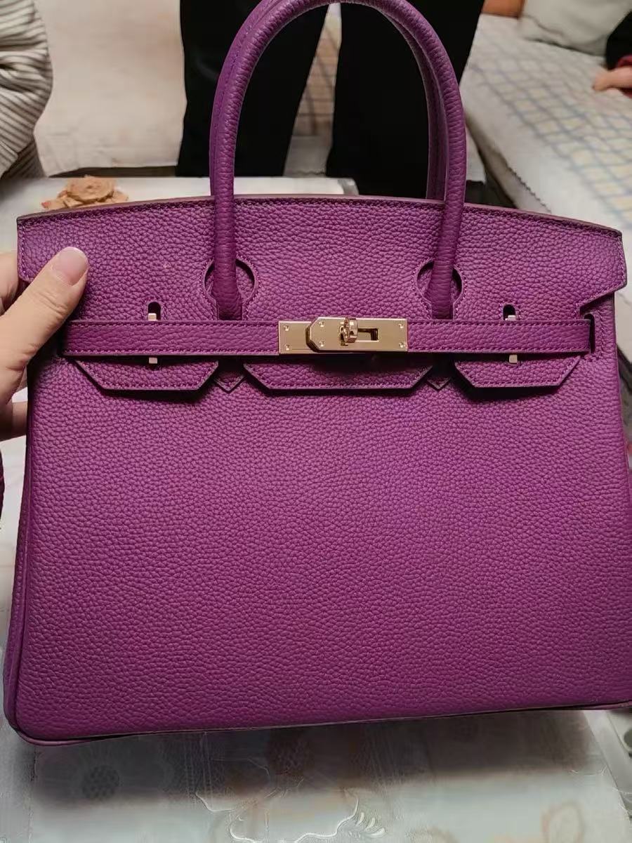 Women's Vintage Full-Grain Leather Top Handle Bag In Gold Lock Closure photo review