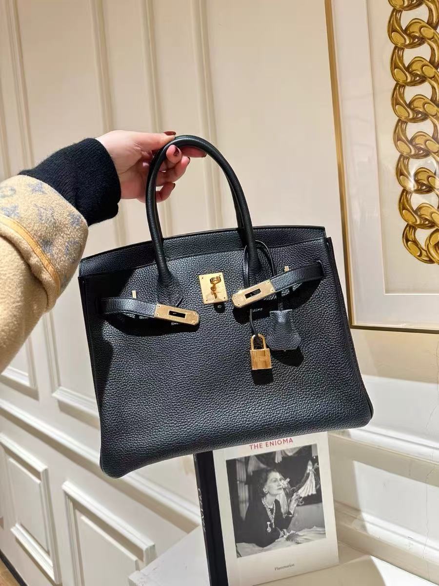 Women's Vintage Full-Grain Leather Top Handle Bag In Gold Lock Closure photo review