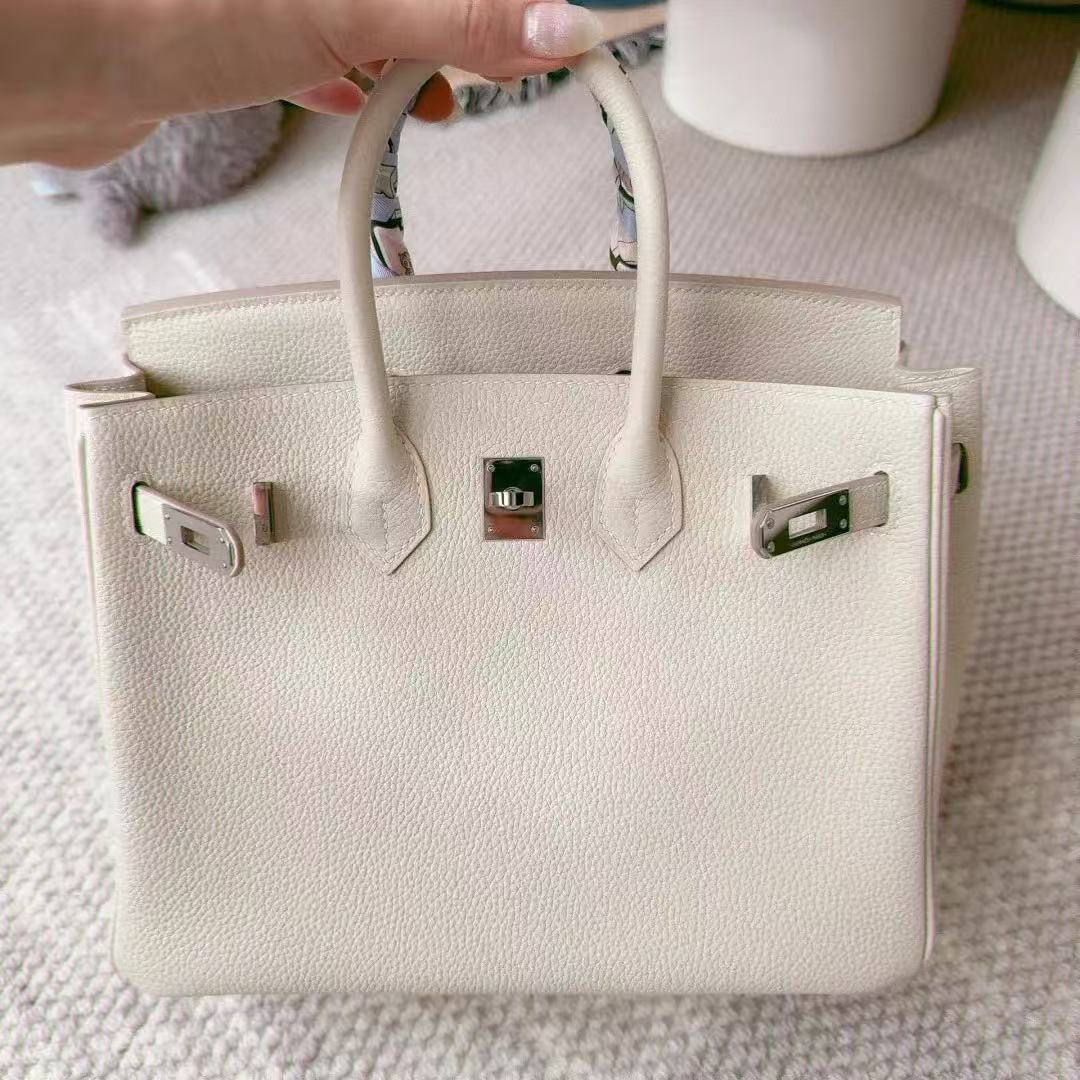 Women's Full-Grain Leather Top Handle Bag In Silver Lock Closure photo review