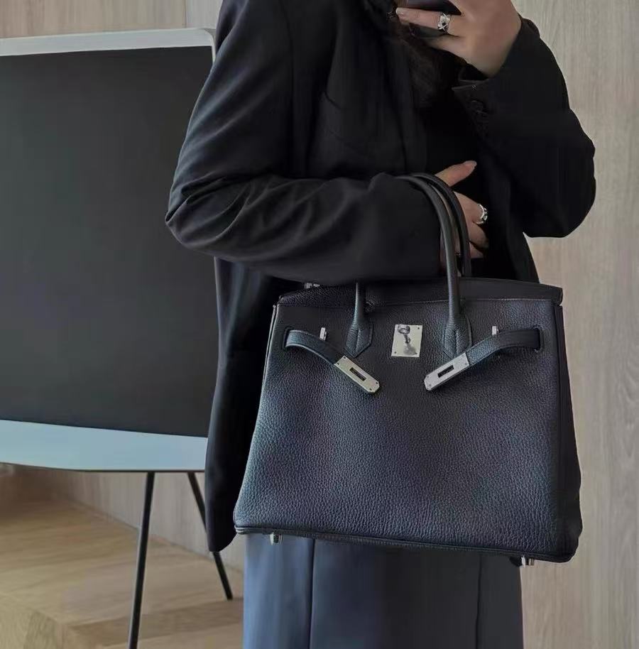 Women's Full-Grain Leather Top Handle Bag In Silver Lock Closure photo review