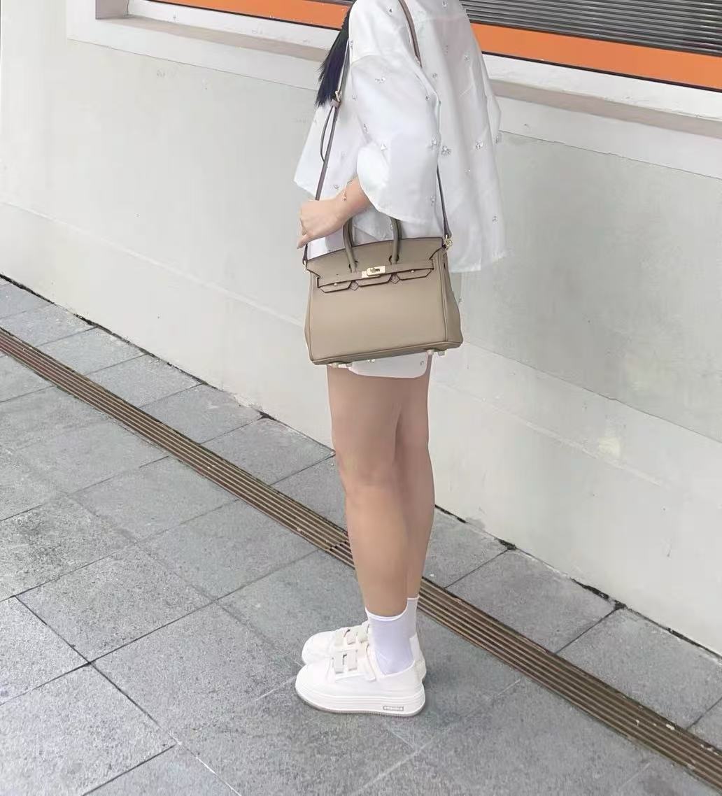 Women's Vintage Full-Grain Leather Top Handle Bag In Gold Lock Closure photo review