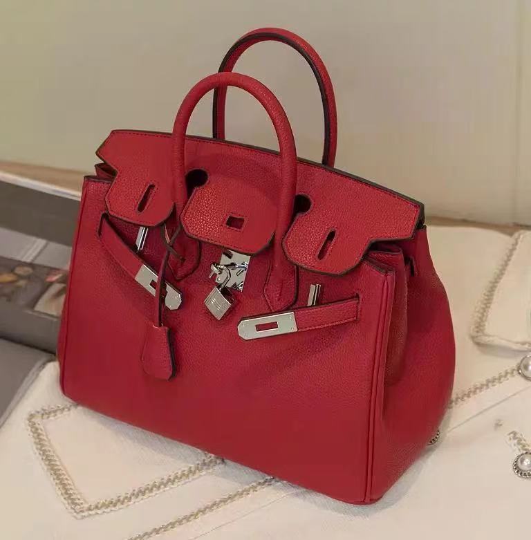 Women's Full-Grain Leather Top Handle Bag In Silver Lock Closure photo review