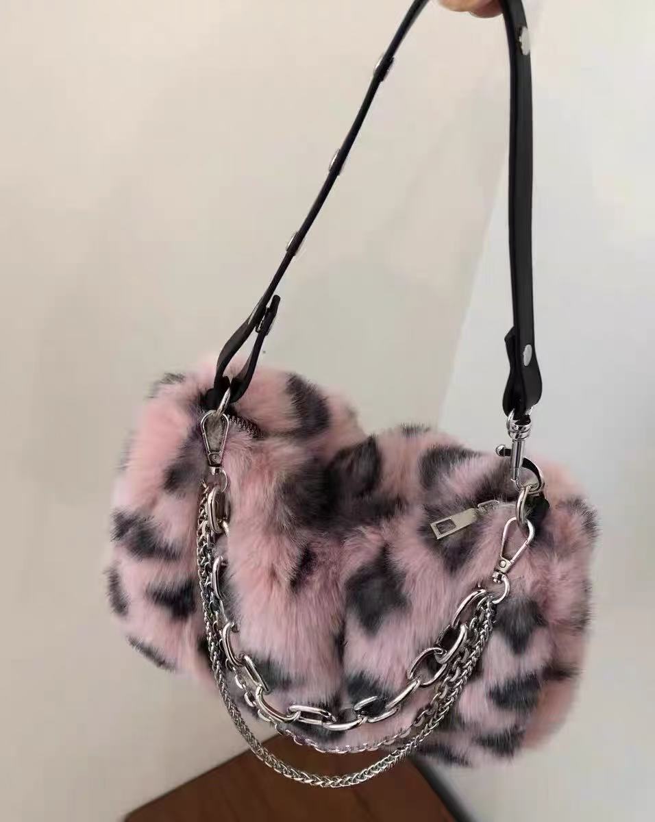 Pelzige bedruckte Handtaschen für Frauen photo review