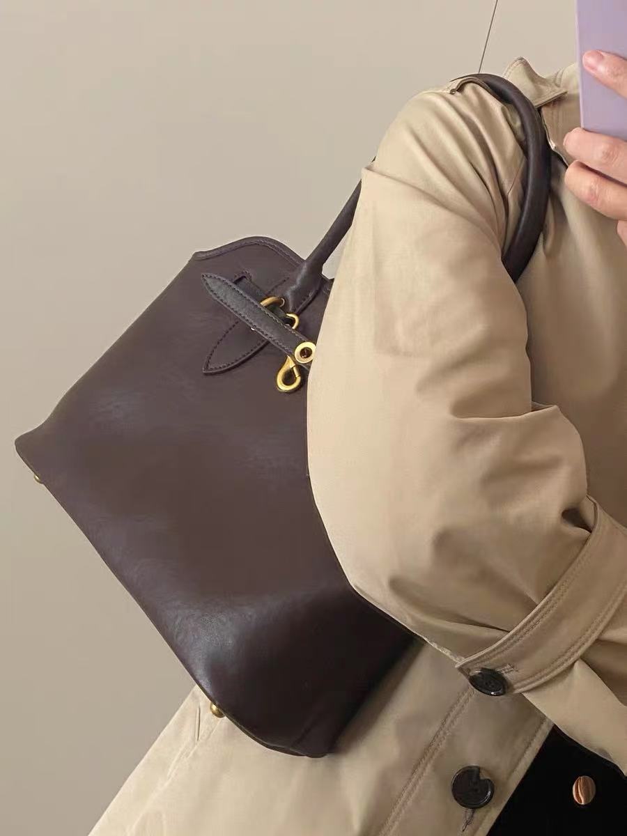 Women's Vintage Genuine Leather Tote Bag With Drawstring Buckle photo review