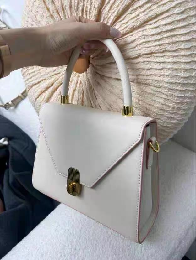 Sac à main à rabat enveloppant en cuir véritable pour femmes photo review