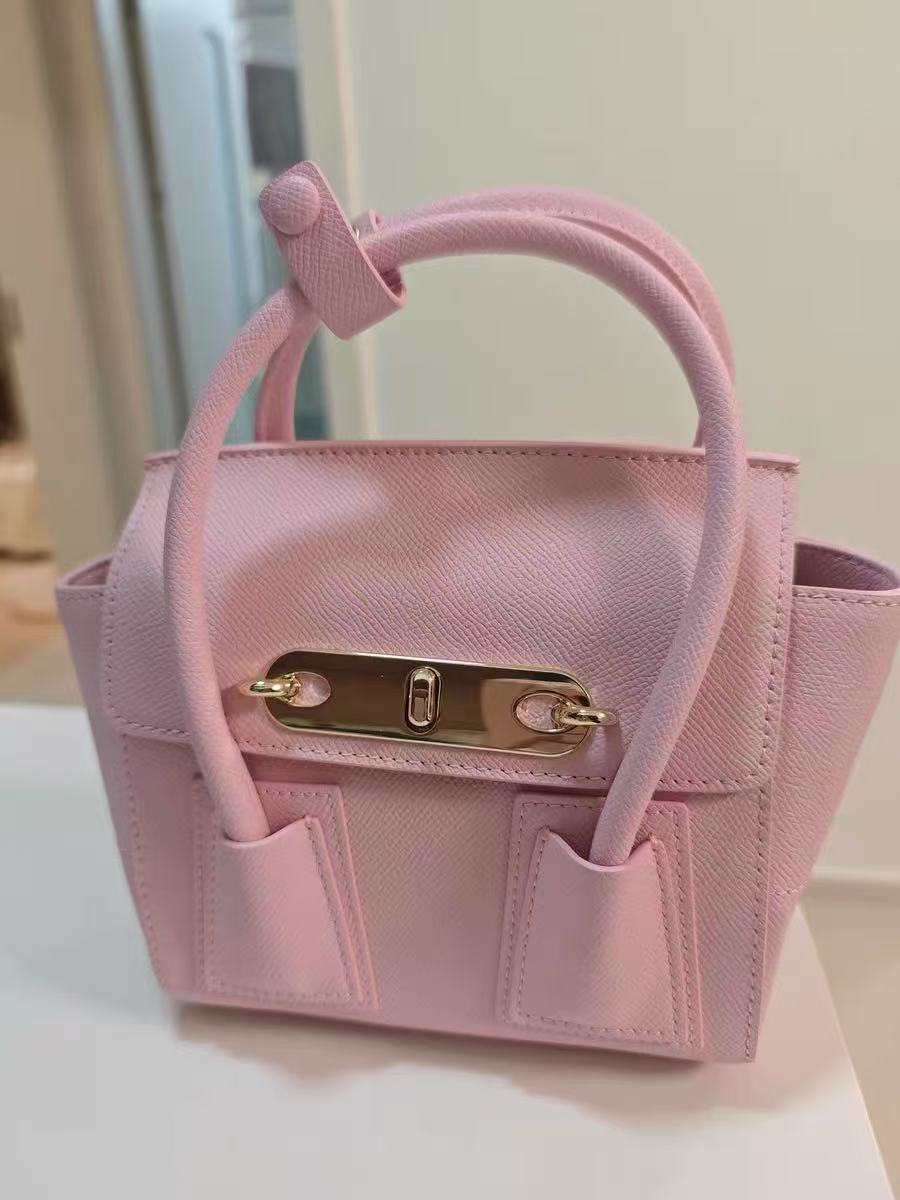 Sac à main Minimalist Genuine Leather Lock Buckle Double Wing Crossbody Shoulder Handbag photo review