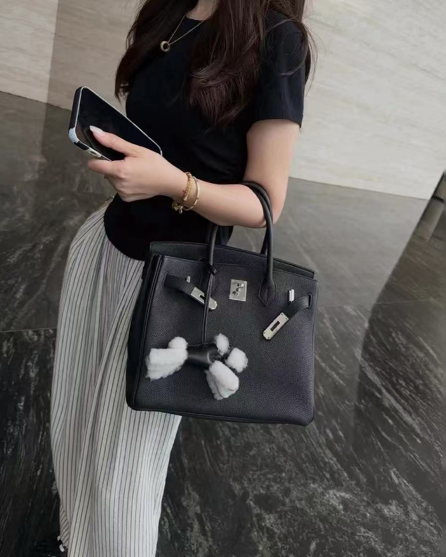 Women's Full-Grain Leather Top Handle Bag In Silver Lock Closure photo review