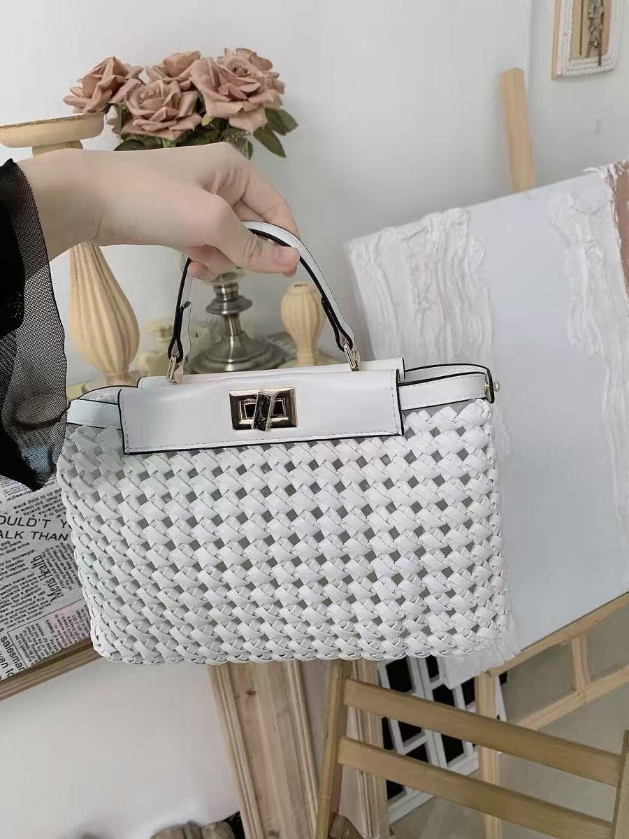 Women's Woven Hollow Lock Schulter Crossbody Top Handle Bag photo review