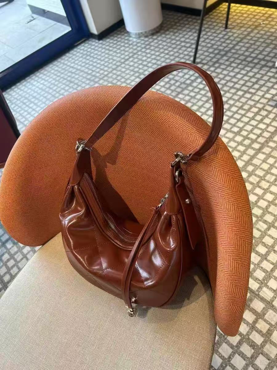 Women's Minimalist Quilted Genuine Leather Crescent Shoulder Hobo Bag photo review