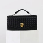Minimalistische gewebte Damen Clutch Tasche mit geteiltem Ledergriff