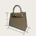 Women's Vintage Ostrich Embossed Full-Grain Leather Handbag In Gold Hardware