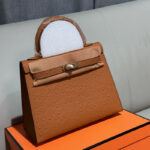 Women's Vintage Ostrich Embossed Full-Grain Leather Handbag In Gold Hardware