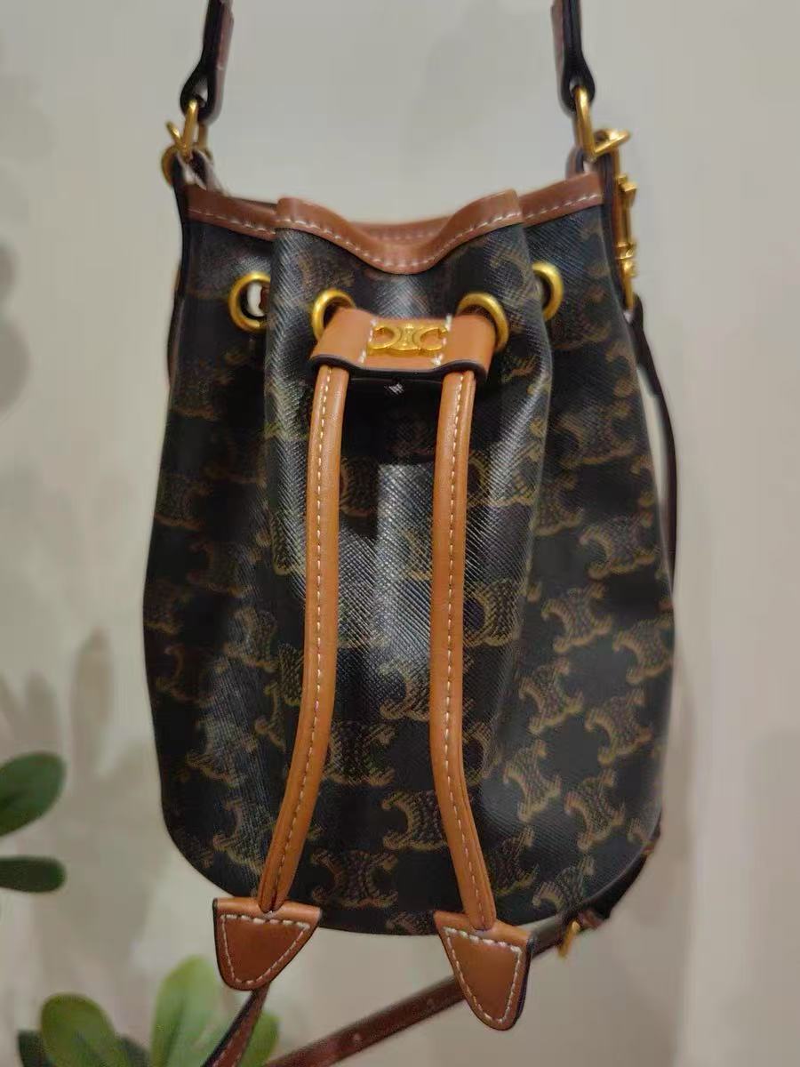 Women's Vintage Split Leather Printed Drawstring Bucket Bag In Gold Hardware photo review