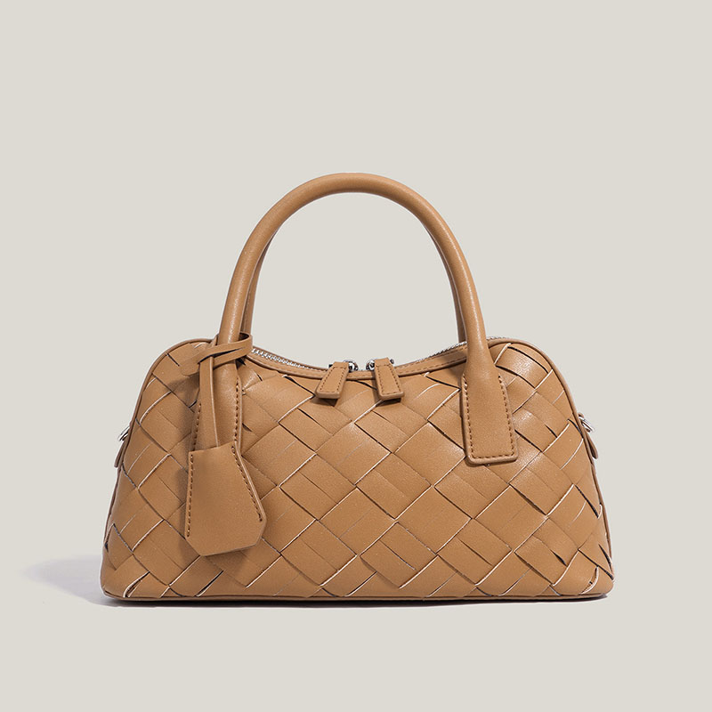 Minimalistische Damen Bowling Handtasche aus gewobenem Spaltleder
