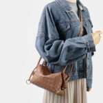 Vintage Mini Handtasche aus echtem Leder in Form eines gewebten Kissens