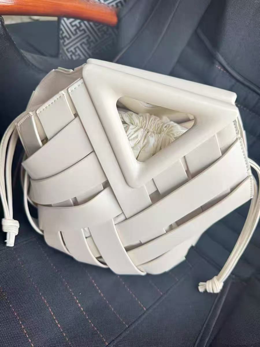 Women's Woven Split Leather Bucket Triangle Handle Shoulder Crossbody Bag photo review