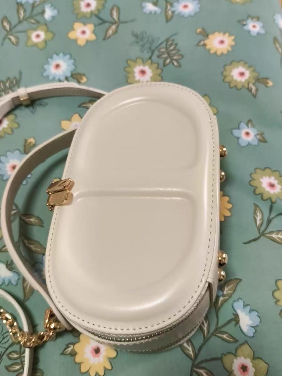 Damen Echtes Leder Minimalistische Ovale Box Crossbody Kette Handtasche photo review