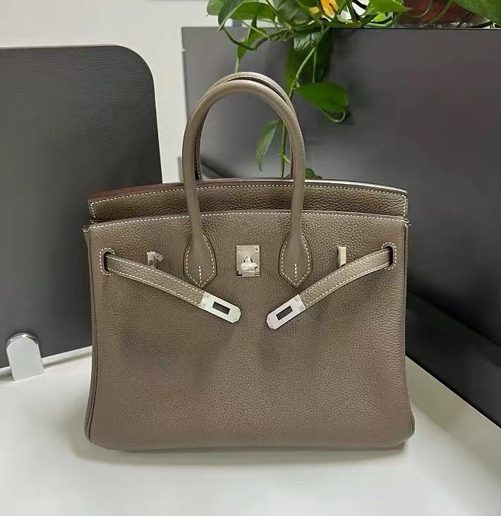 Women's Full-Grain Leather Top Handle Bag In Silver Lock Closure photo review