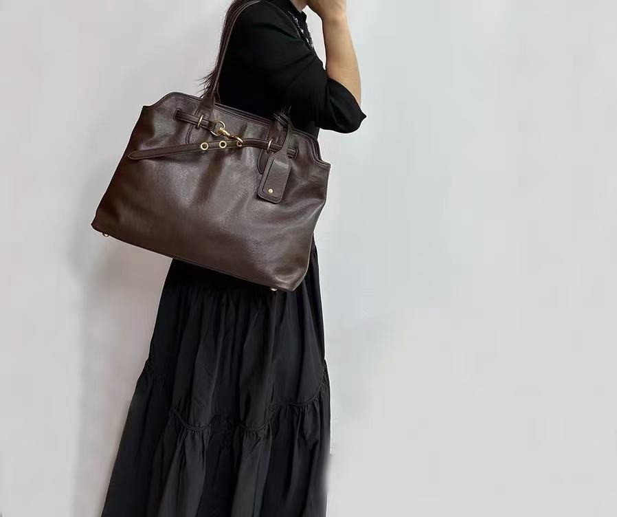 Women's Vintage Genuine Leather Drawstring Lock Shell Crossbody Strap Tote Bag photo review