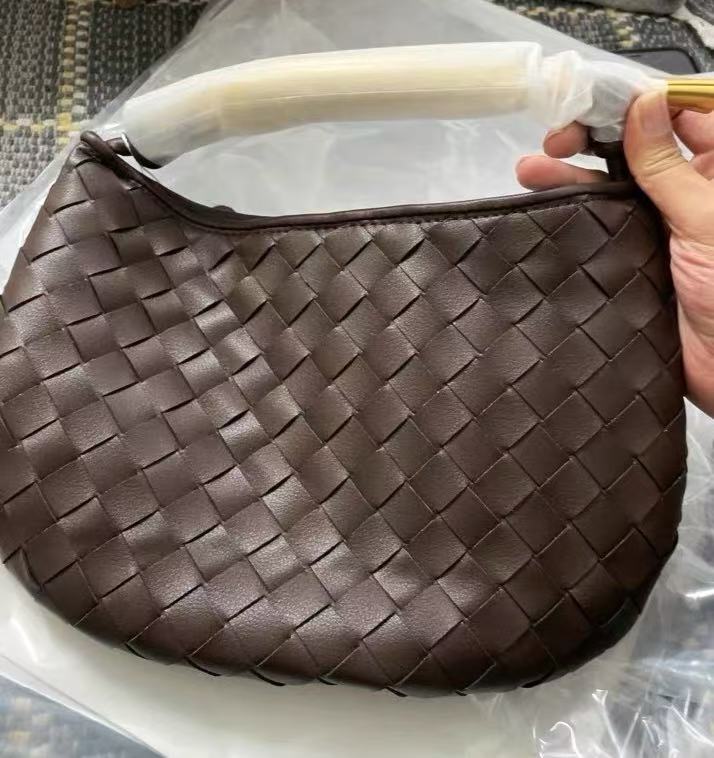 Women's Woven Dumpling Clutch Bag photo review