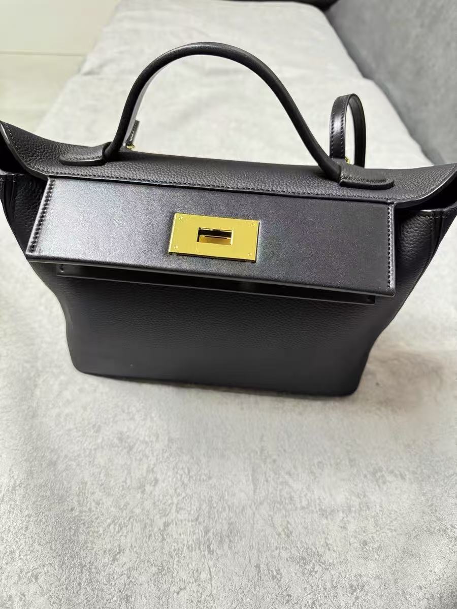 Minimalistische Damen Leder Schloss Verschluss Knödel-förmige Top Handle Tasche photo review
