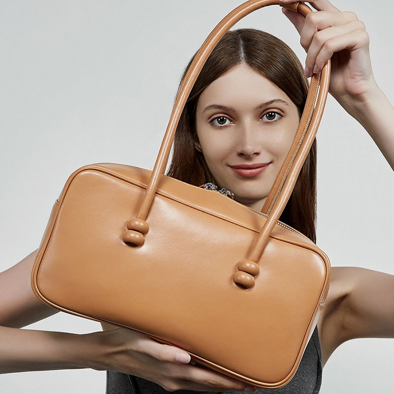 Minimalistische Boston Baguette Tasche aus echtem Leder für Damen
