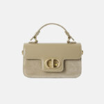 Minimalistische Damen-Tasche aus Leder und Wildleder mit goldener Hardware