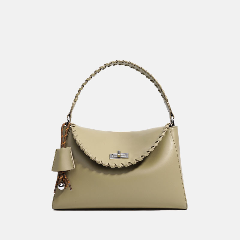 Minimalistische Damen Handtasche aus Leder mit geflochtenen Details und silberner Hardware