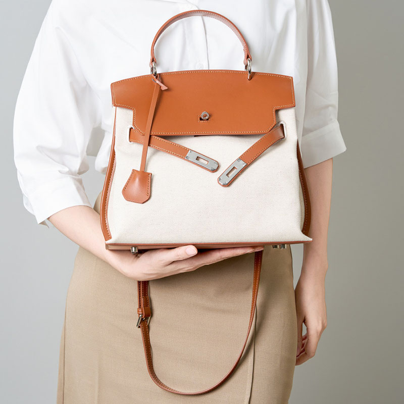 Sac à main en toile en cuir véritable bicolore pour femmes avec des accessoires en argent