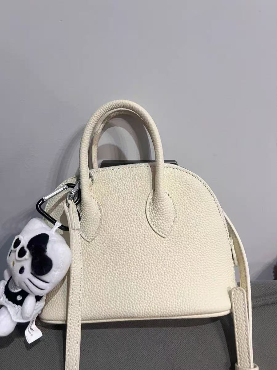 Women's Vintage Top-Grain Leather Lychee Texture Shell-Shaped Handbag photo review