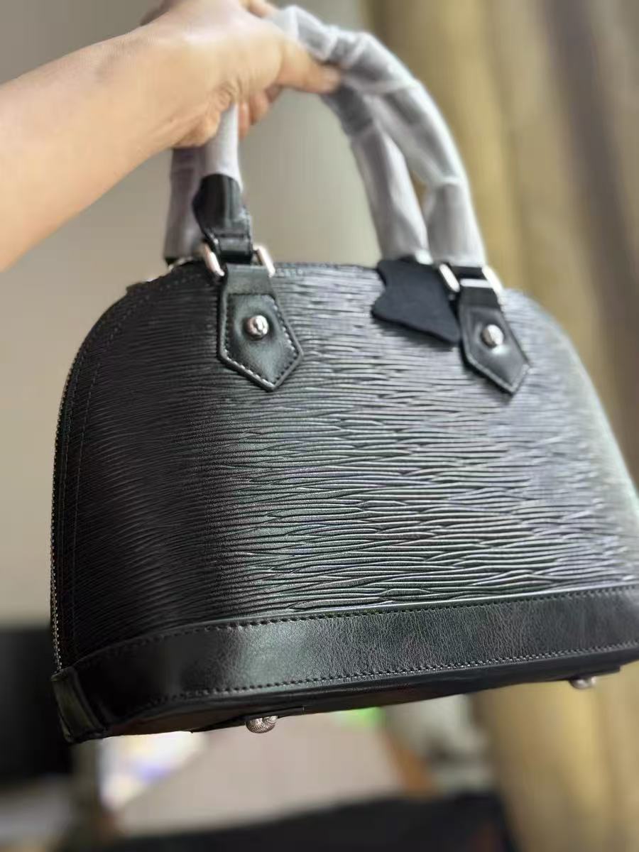 Sac à main en cuir véritable avec boucle de verrouillage en forme de coquillage pour femmes photo review