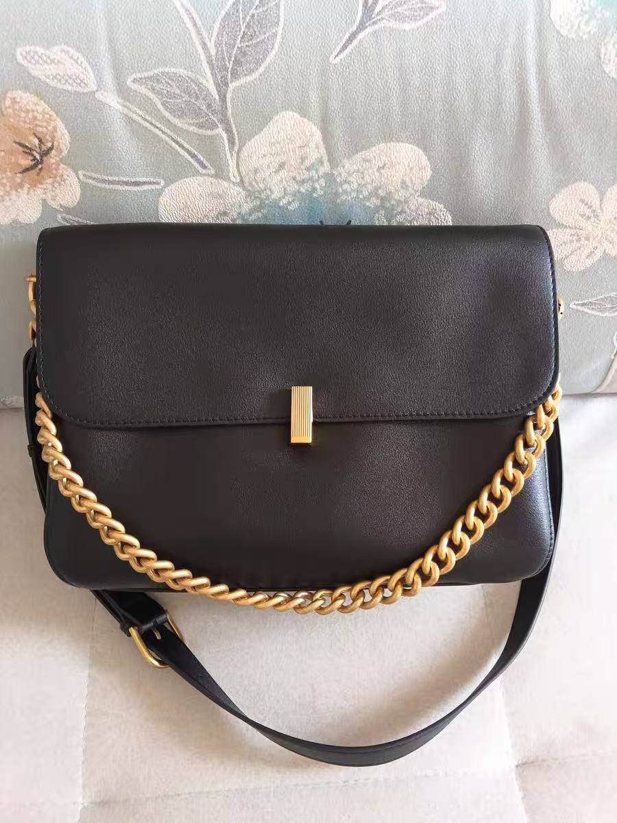 Women's Minimalist Genuine Leather Lock Buckle Crossbody Chain Bag photo review