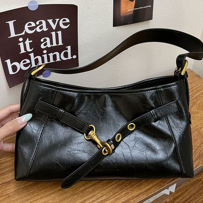 Sac à bandoulière en cuir ciré noir à effet craquelé pour femmes, avec accessoires en or