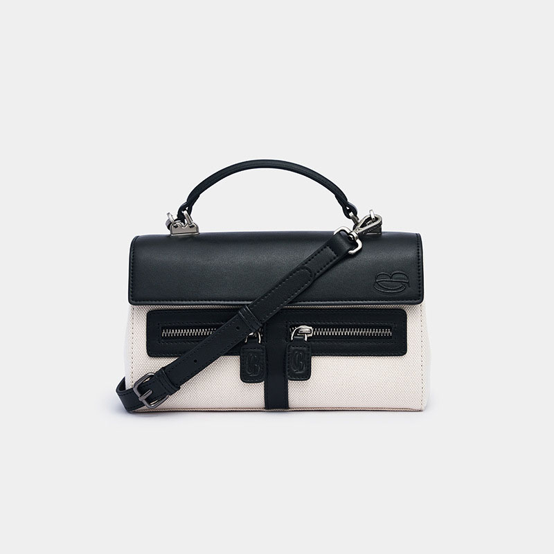 Sac à main en cuir noir avec bandoulière en toile blanche pour femmes