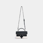Sac à main en cuir noir avec bandoulière en toile blanche pour femmes