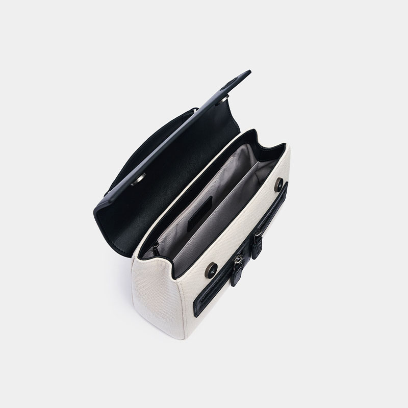 Sac à main en cuir noir avec bandoulière en toile blanche pour femmes