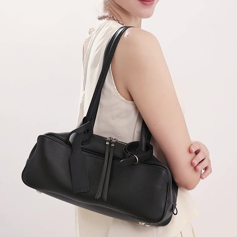 Damen Baguette-Tasche aus feinstem Leder in Form eines Kissens