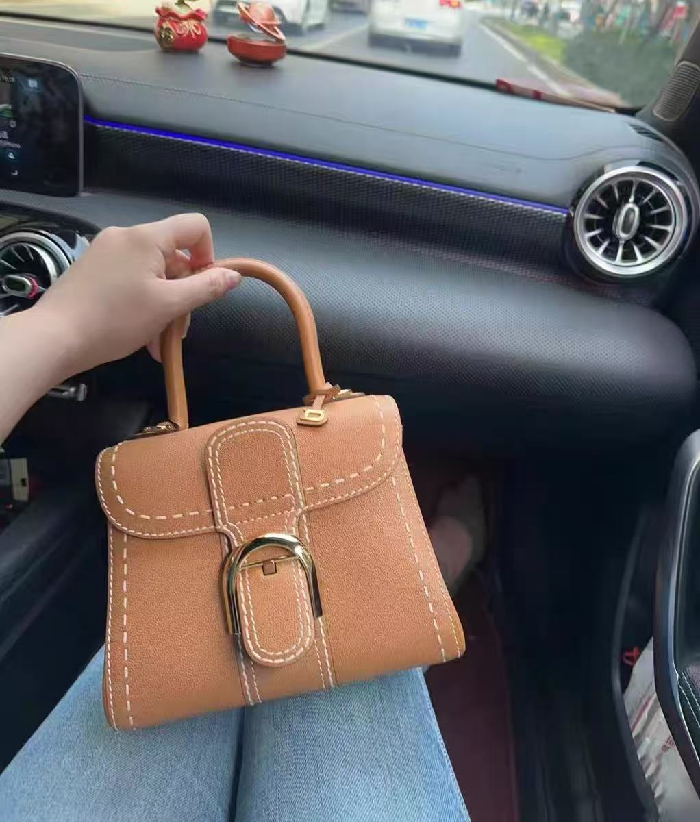 Women's Genuine Leather Buckle Closure Top Handle Bag with Crossbody Strap photo review