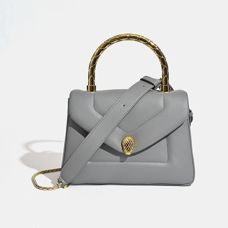 Petit sac à main minimaliste en cuir à tête de serpent avec fermoir en métal doré
