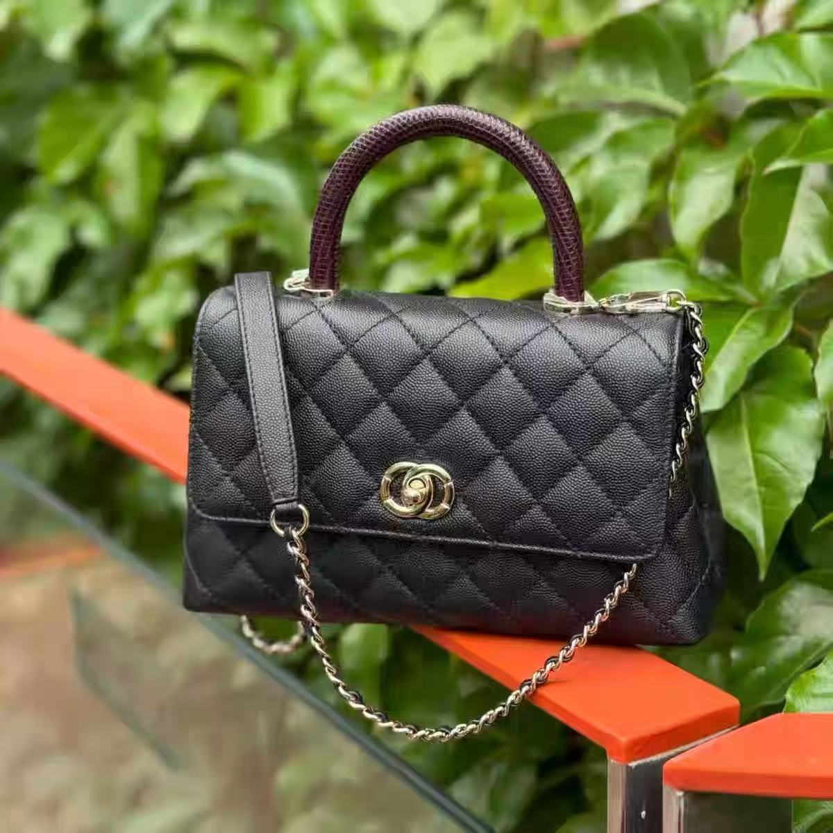 Women's Vintage Black Quilted Full-Grain Leather Chain Strap Top Handle Bag In Gold Hardware photo review