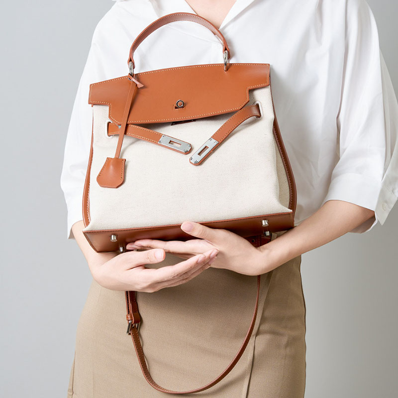 Minimalistische Damen Segeltuch Echtes Leder Top Handle Tasche in Silber Hardware