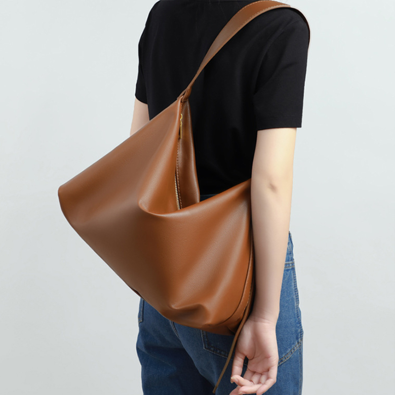 Sac hobo en cuir en forme d'oreiller avec fermeture à glissière pour femmes