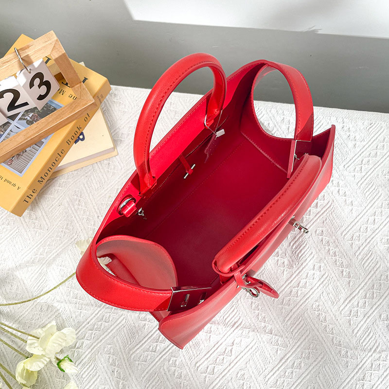 Sac à bandoulière ovale en cuir pour femmes, avec poignée supérieure en métal doré