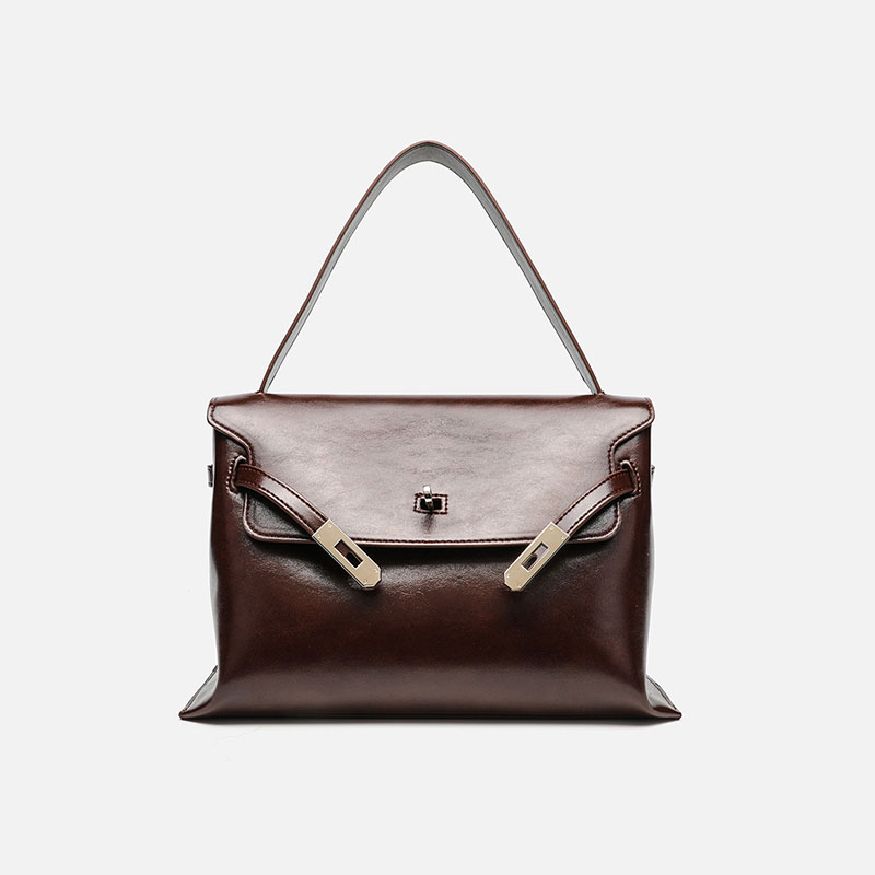 Sac à main minimaliste en cuir de vachette avec rabat en métal argenté