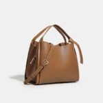 Minimalistische Eimerhandtasche aus echtem Leder mit Umhängeriemen für Frauen