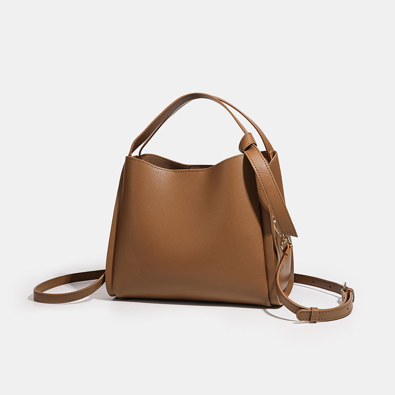 Minimalistische Eimerhandtasche aus echtem Leder mit Umhängeriemen für Frauen